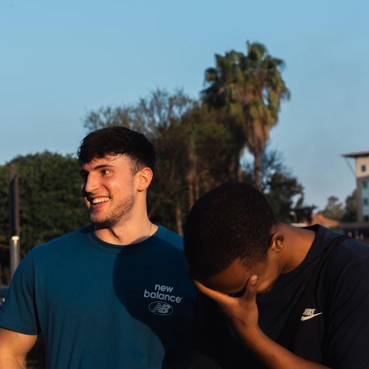 Aisha Rao, Lead Design Curator at Island Lumen Joy, reviewing corporate floral arrangements